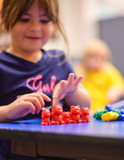 Girl playing with toys at Spring Hill Academy Preschool